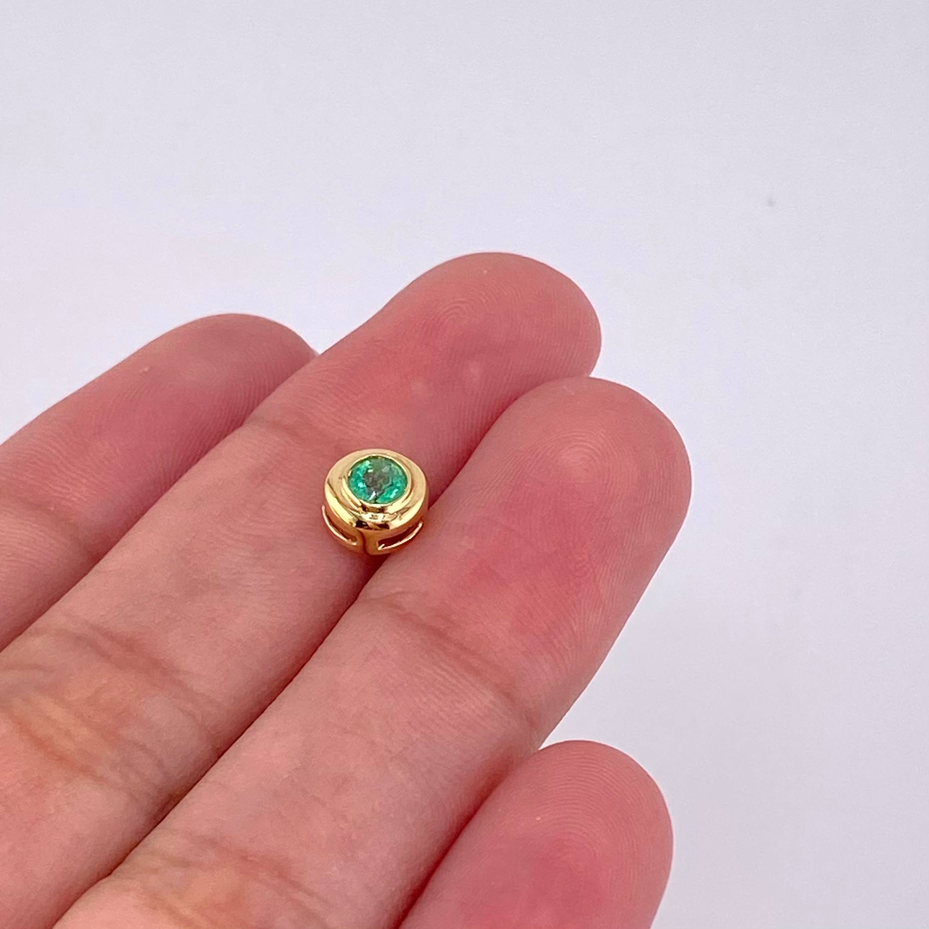 Dije Ojo Esmeralda 14pts 0.55g / 0.6cm Oro Amarillo 18K
