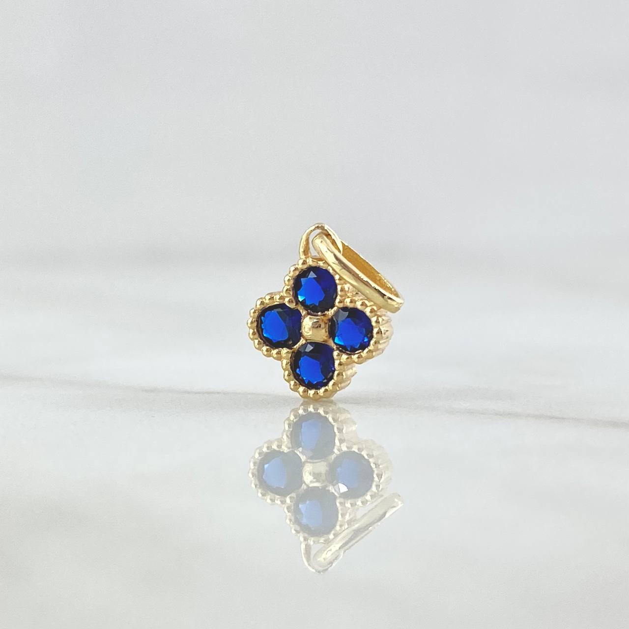 Dije Flor Borde Texturizado 1.15gr / 1.5cm / Circones Azul Rey Oro Amarillo 18K ©