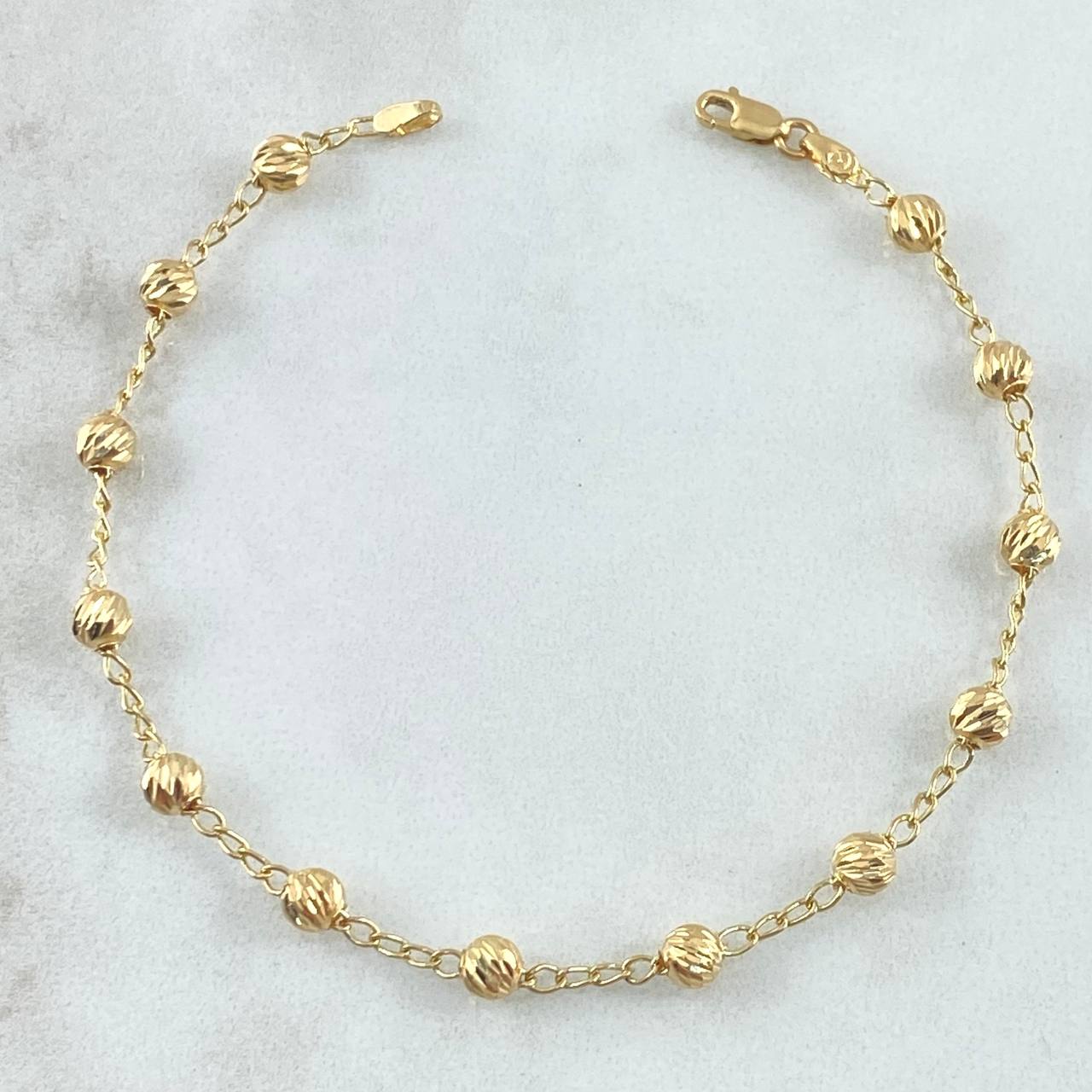 Pulso Espiga 2.7gr / 18cm / 4mm Bolas Diamantadas Oro Amarillo 18K *