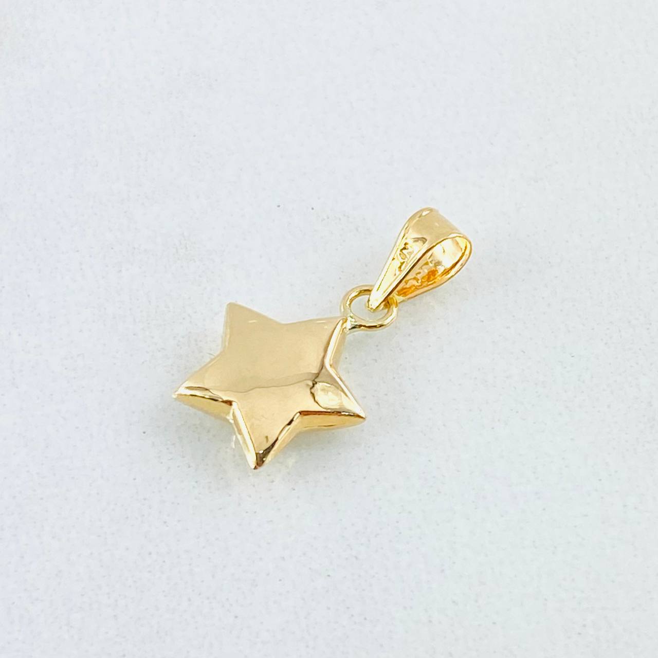Dije Estrella 0.9gr / 2.3cm / Oro Amarillo 18K