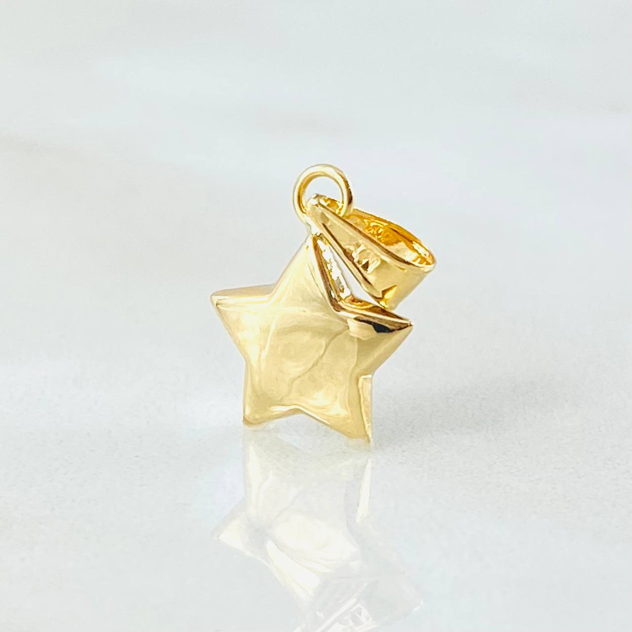 Dije Estrella 0.4gr / 1.7cm / Oro Amarillo 18K ©