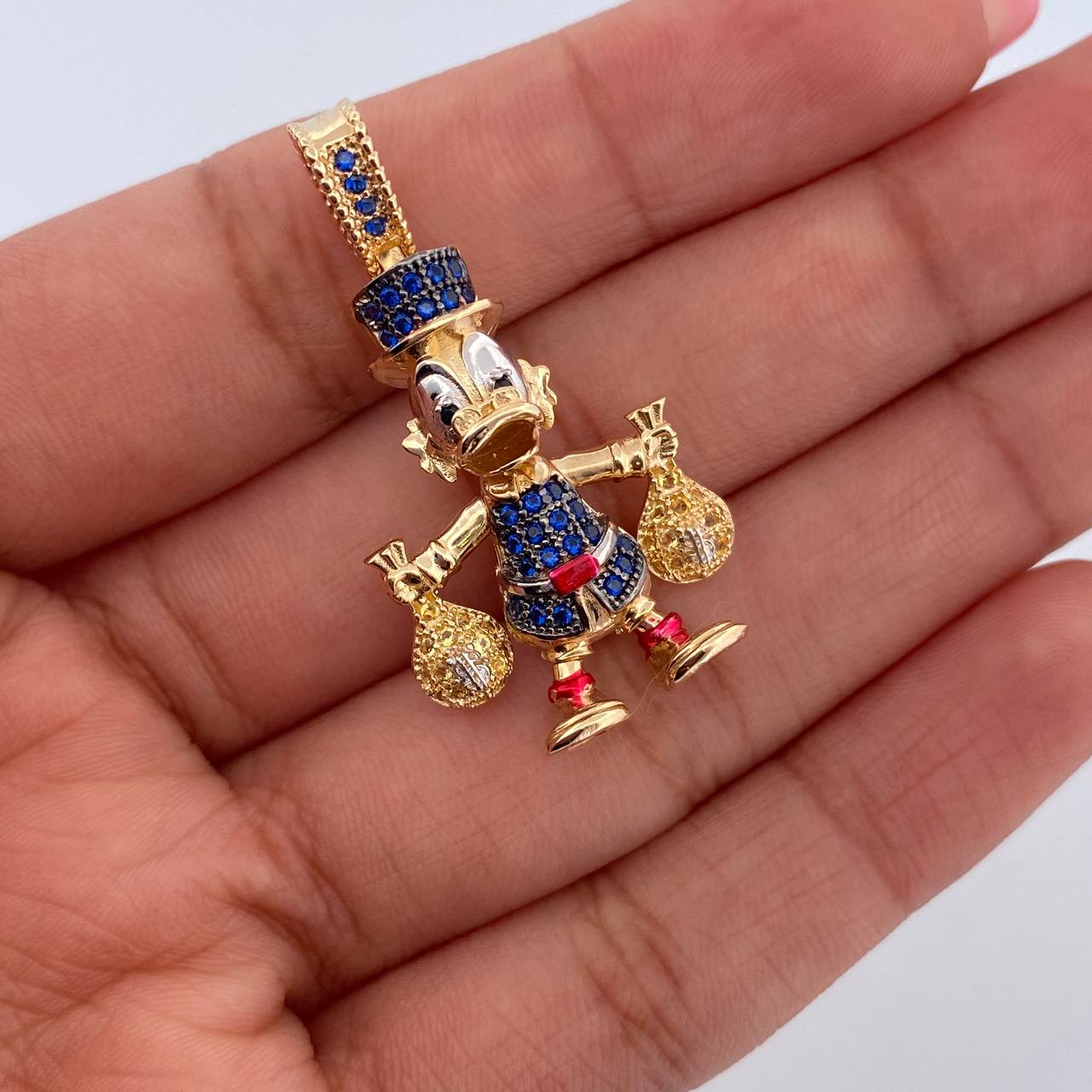 Dije Pato Bolsas Dinero 6.05gr / 3.5cm / Oro 18K $