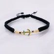Pulsera Tejida Negra Ancla Bolas Diamantadas Oro Amarillo 18K