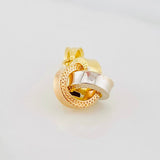 Dije Nudo 0.55g / 1.5cm Tres Oros 18K