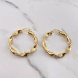 Candongas Amber 3.95gr / 3cm / Entorchadas Oro Amarillo 18K $