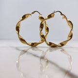 Candongas Amber 3.95gr / 3cm / Entorchadas Oro Amarillo 18K $
