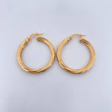 Candongas Mary 2.8gr / 3cm / Rayadas Oro Amarillo 18K $