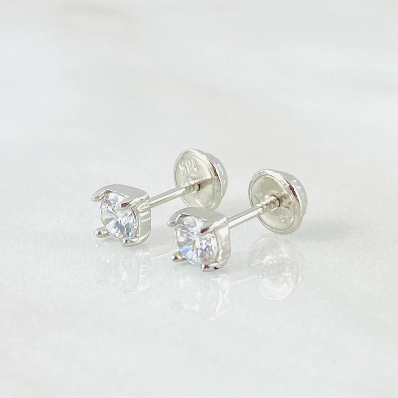 Topos Bisel 0.85gr / Oro Blanco 18K