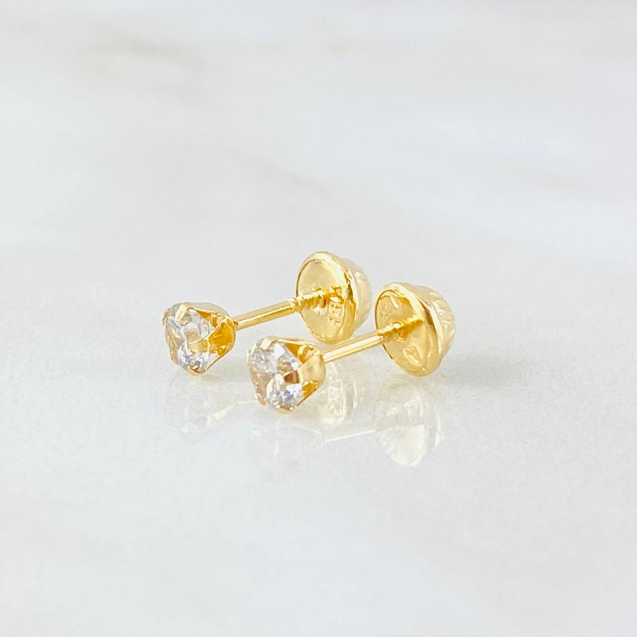 Topos Bisel 0.65gr / Oro Amarillo 18K