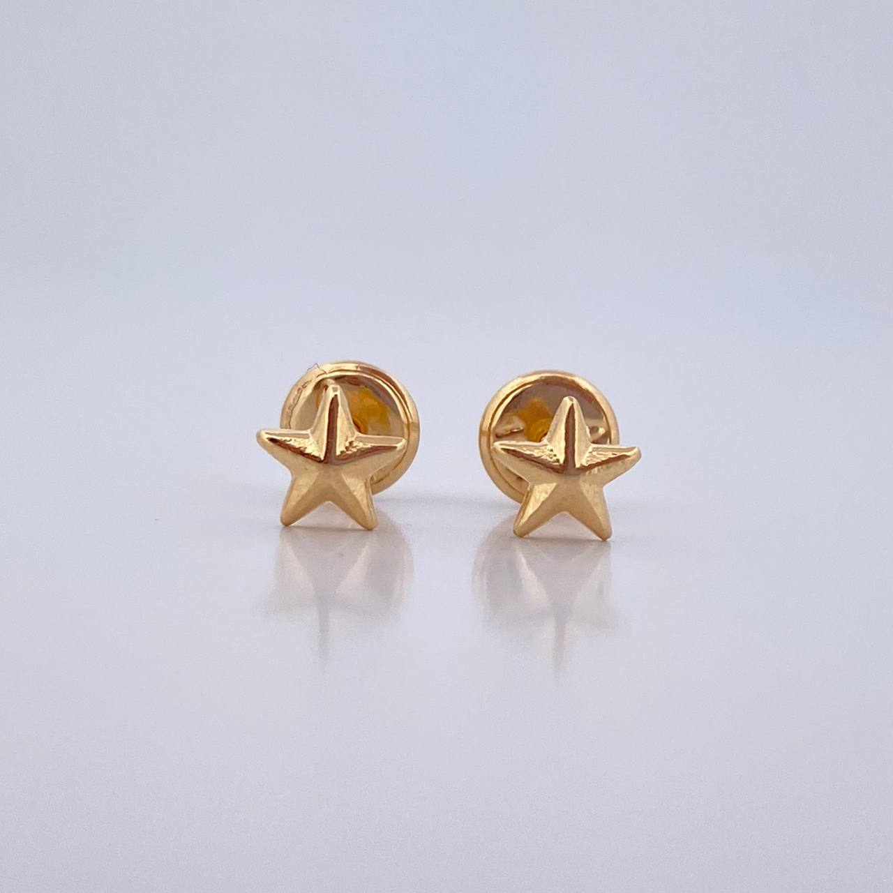 Topos Estrella 0.45gr / Troquelado Oro Amarillo 18K $