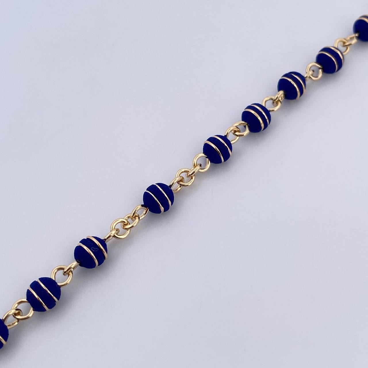 Rosario Virgen Maria 18.7gr / 56.8cm / 5mm Neoros 2 Rayas Azules Oro Amarillo 18K $
