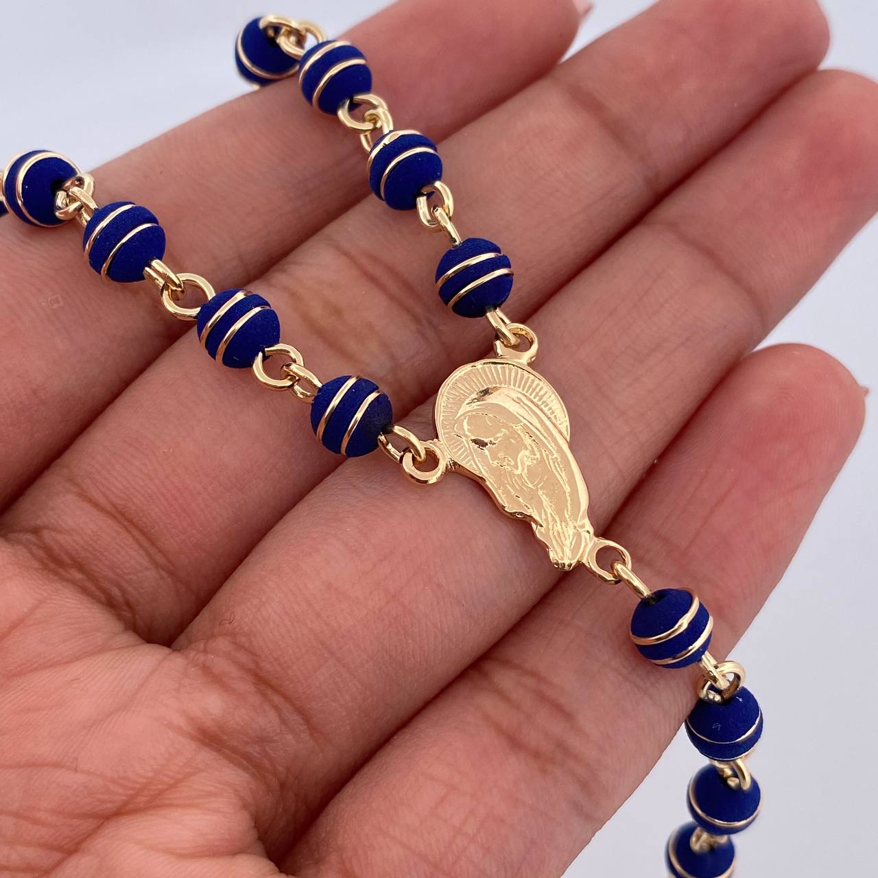 Rosario Virgen Maria 18.7gr / 56.8cm / 5mm Neoros 2 Rayas Azules Oro Amarillo 18K $