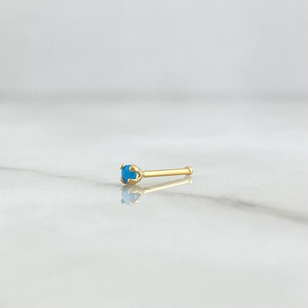 Piercing Chispa Fija 0.1gr / 1cm / Circon Celeste Mate Oro Amarillo 18K (Joya)