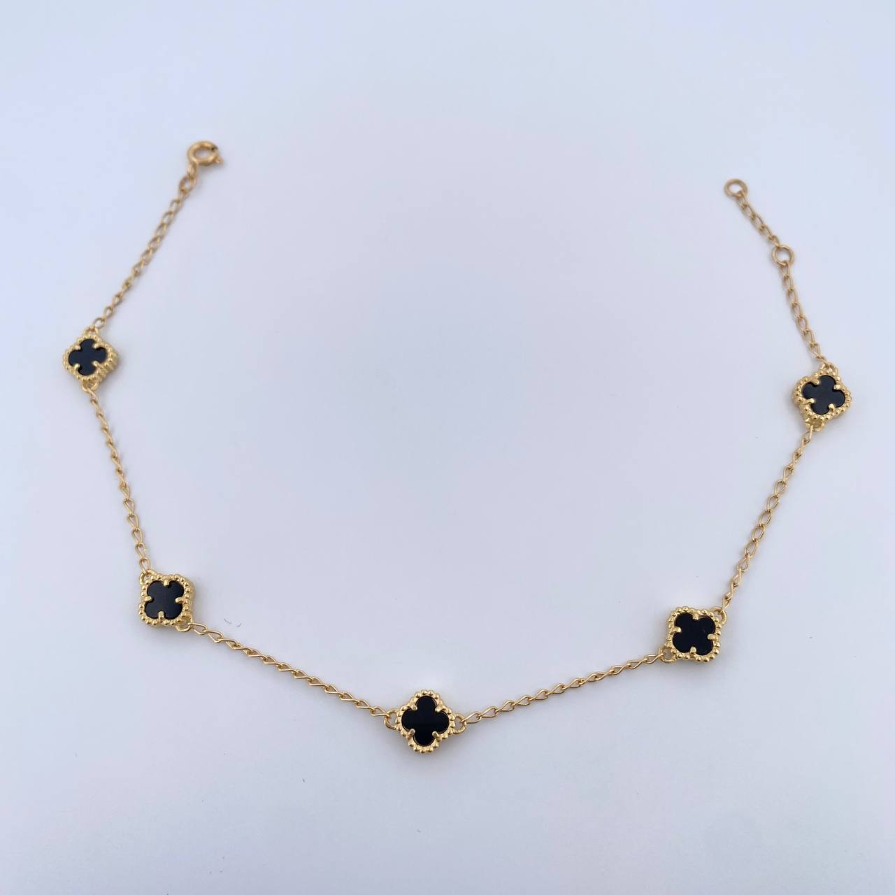 Tobillera Espiga Trebol 5.1gr / 22.6cm-24cm / 1.3mm Onix Negra Oro Amarillo Nac.Esp. 18K $