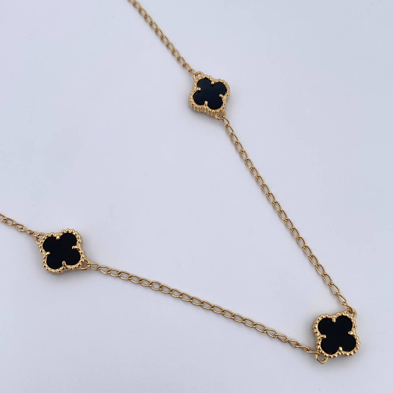 Cadena Espiga Trebol  8.05gr / 49.4cm-52cm / 1.3mm Onix Negra Oro Amarillo Nac.Esp. 18K $