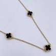 Cadena Espiga Trebol  8.05gr / 49.4cm-52cm / 1.3mm Onix Negra Oro Amarillo Nac.Esp. 18K $