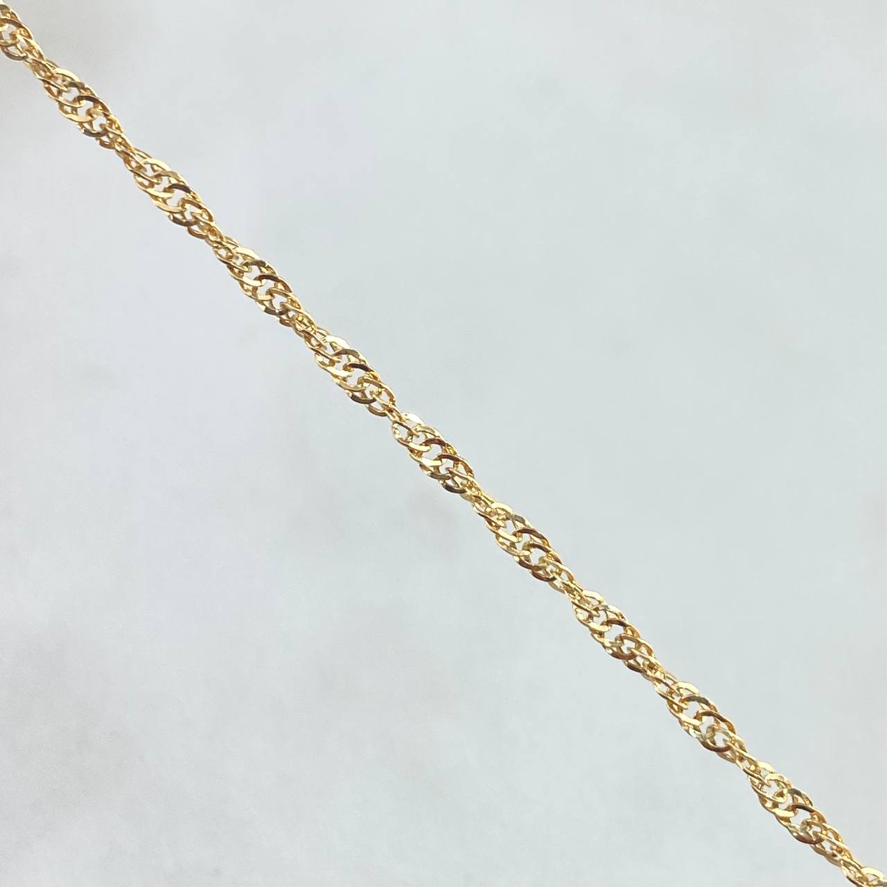 Set Cadena Singapur 1gr / 45cm / 1.7mm + Dije Corazón Corona 0.35gr /1.3cm 1.35gr Oro Amarillo 18K (Oferta) ©