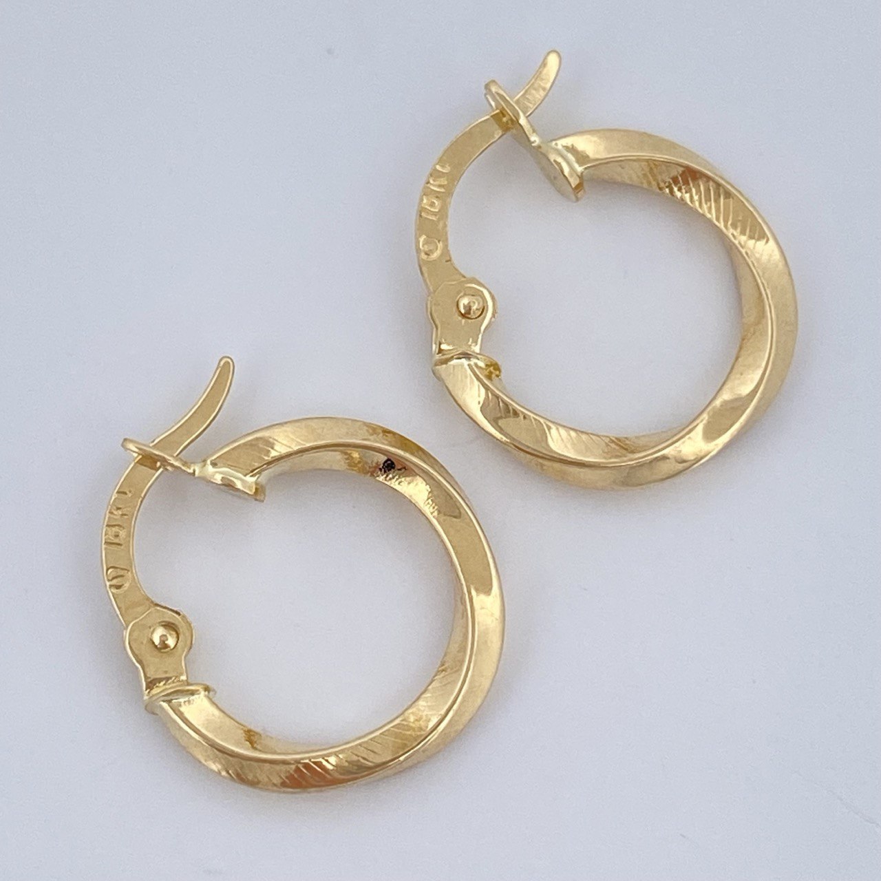 Candongas Clau Entorchadas 0.85gr / 1.5cm / Oro 18K &