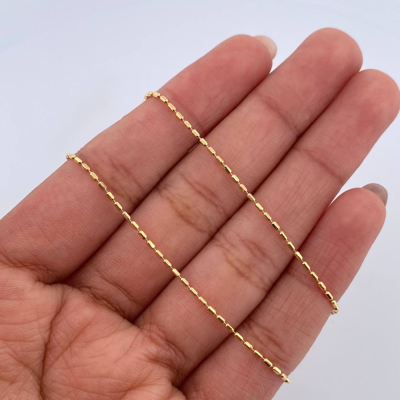 Cadena Morse 2.75gr / 60.3cm / 1mm Oro Amarillo +3 18K $