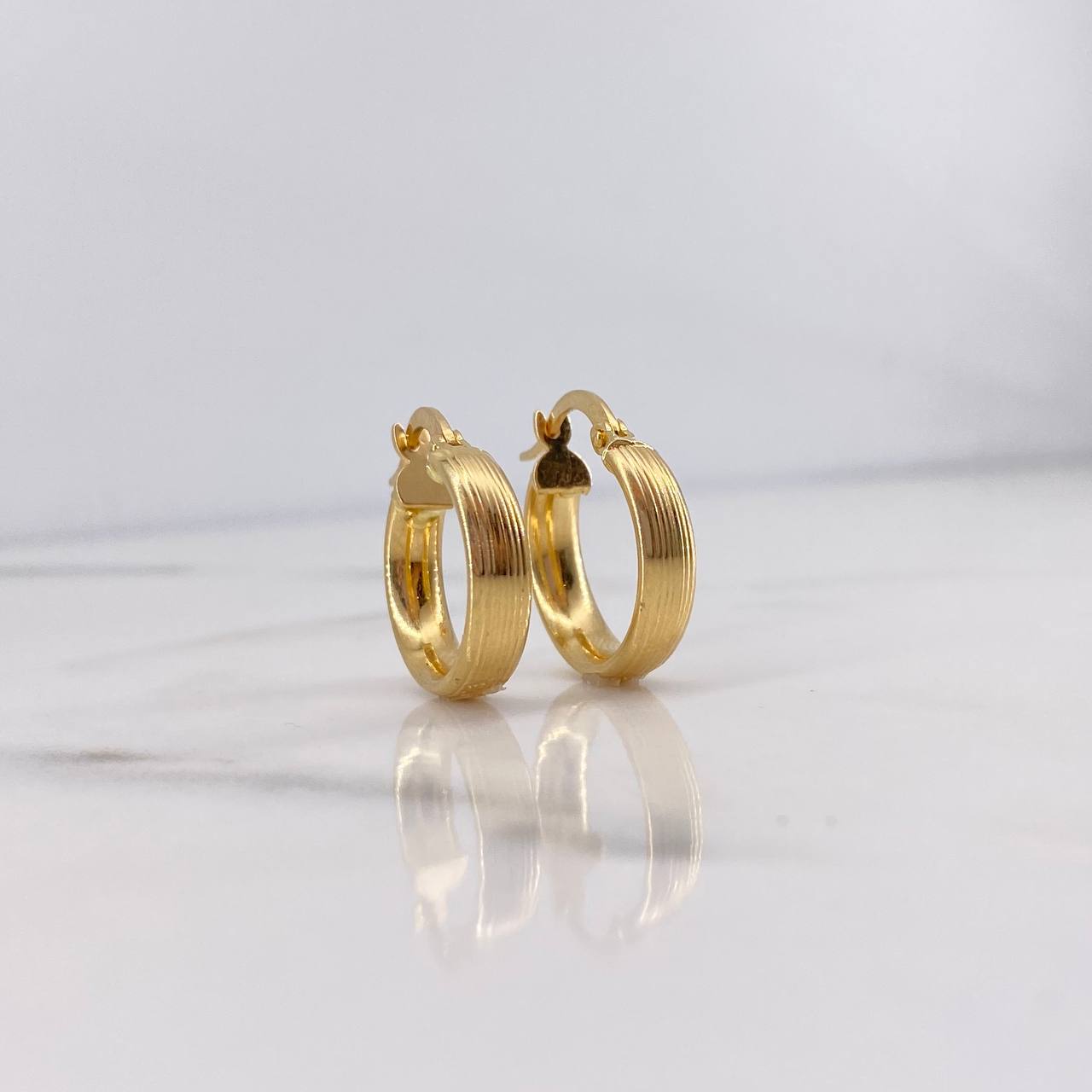 Candongas Andy 1.95gr / 1.9cm / Rayadas Oro Amarillo 18K $