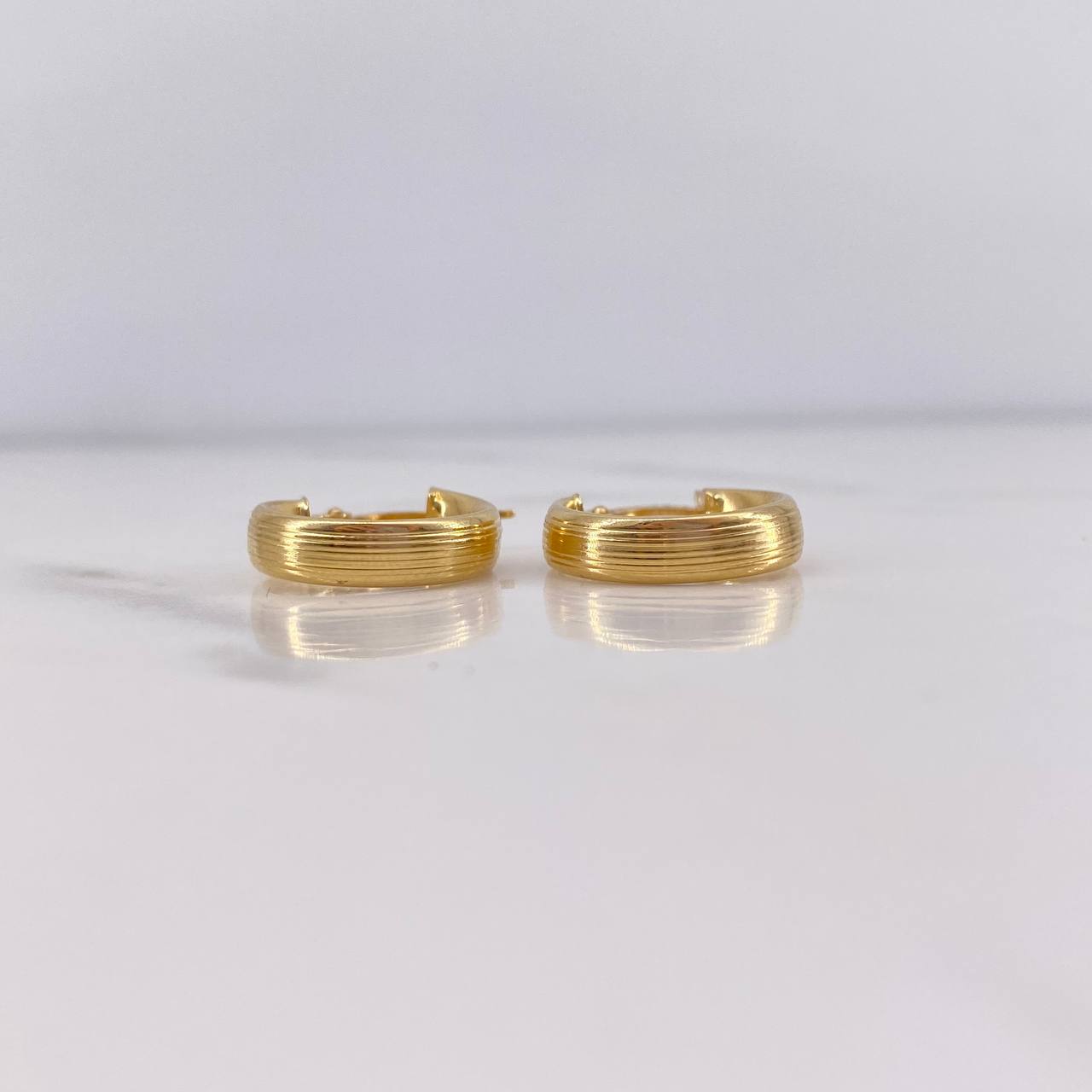 Candongas Andy 1.95gr / 1.9cm / Rayadas Oro Amarillo 18K $