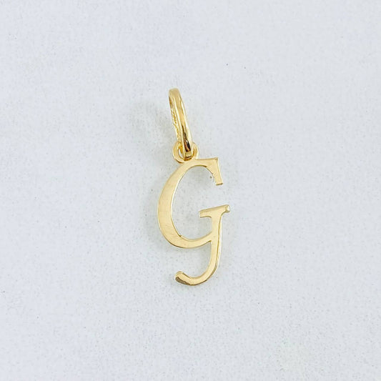 Dije Letra G Cursiva 0.4gr / 2cm / Oro Amarillo 18K ©