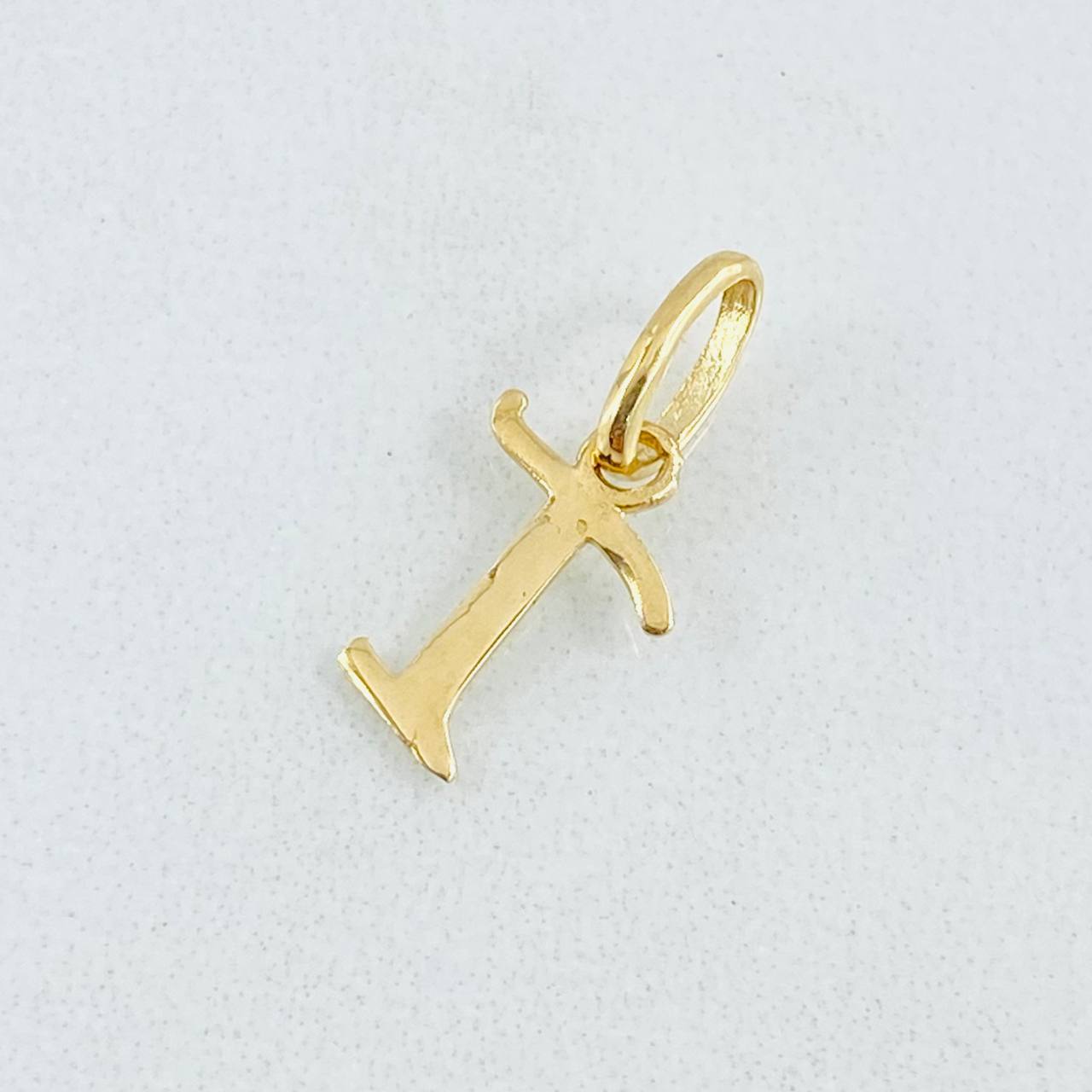 Dije Letra T Cursiva 0.35gr / 1.6cm / Oro Amarillo 18K ©