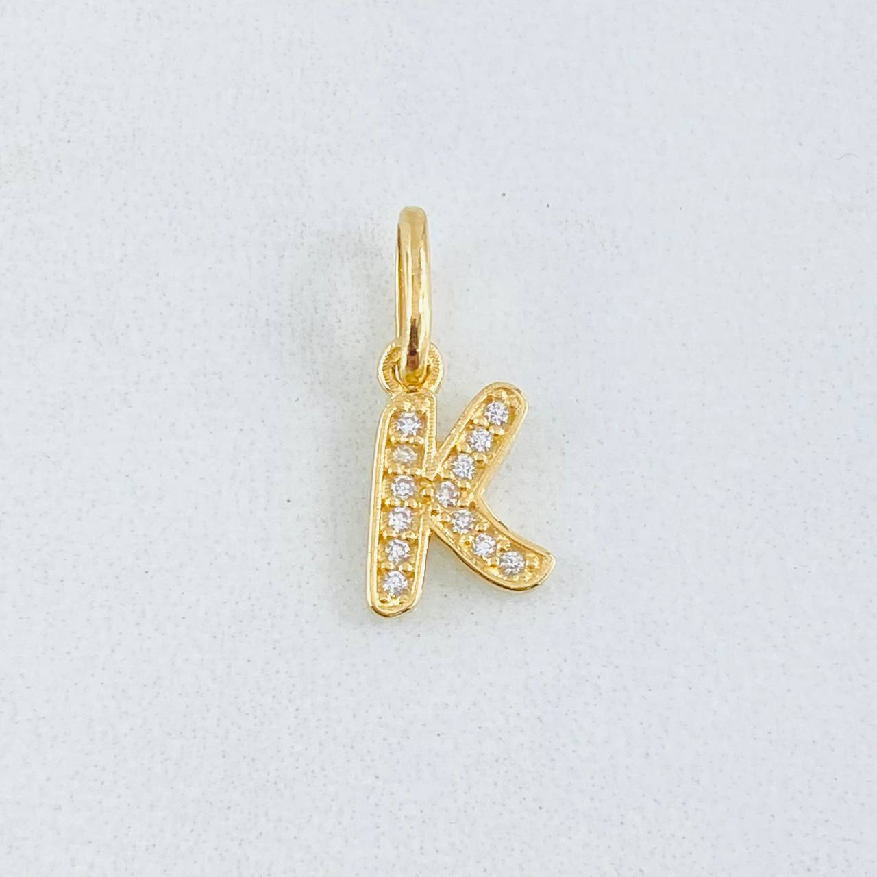 Dije Letra K 0.7gr / 1.6cm / Oro Amarillo 18K ©