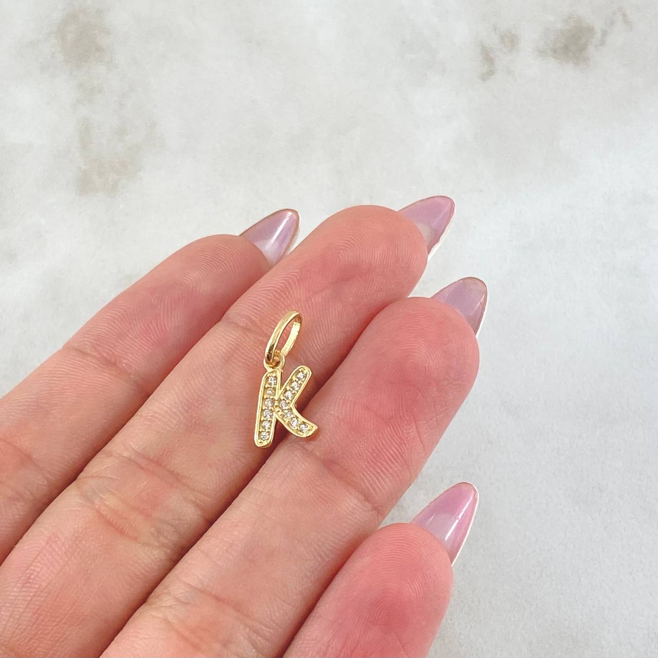 Dije Letra K 0.7gr / 1.6cm / Oro Amarillo 18K ©