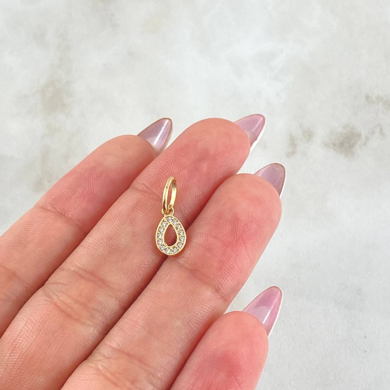 Dije Letra O 0.45gr / 1.6cm / Oro Amarillo 18K ©