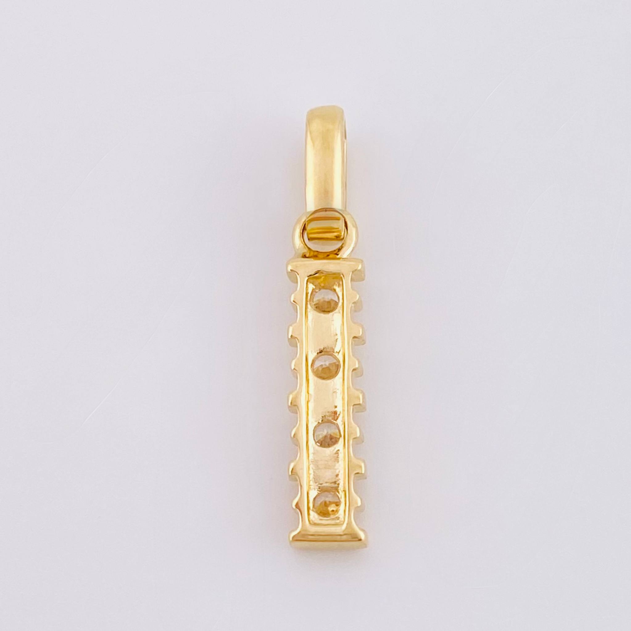 Dije Fila Intersecta 1.2gr / 2.3cm / Oro Amarillo 18K *