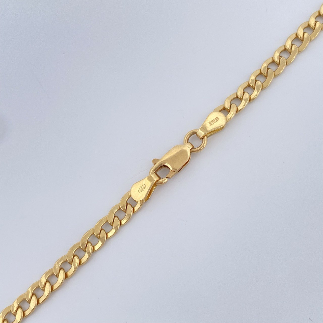 Cadena Cubana  10.9gr / 59.5cm / +1 Oro 18K $
