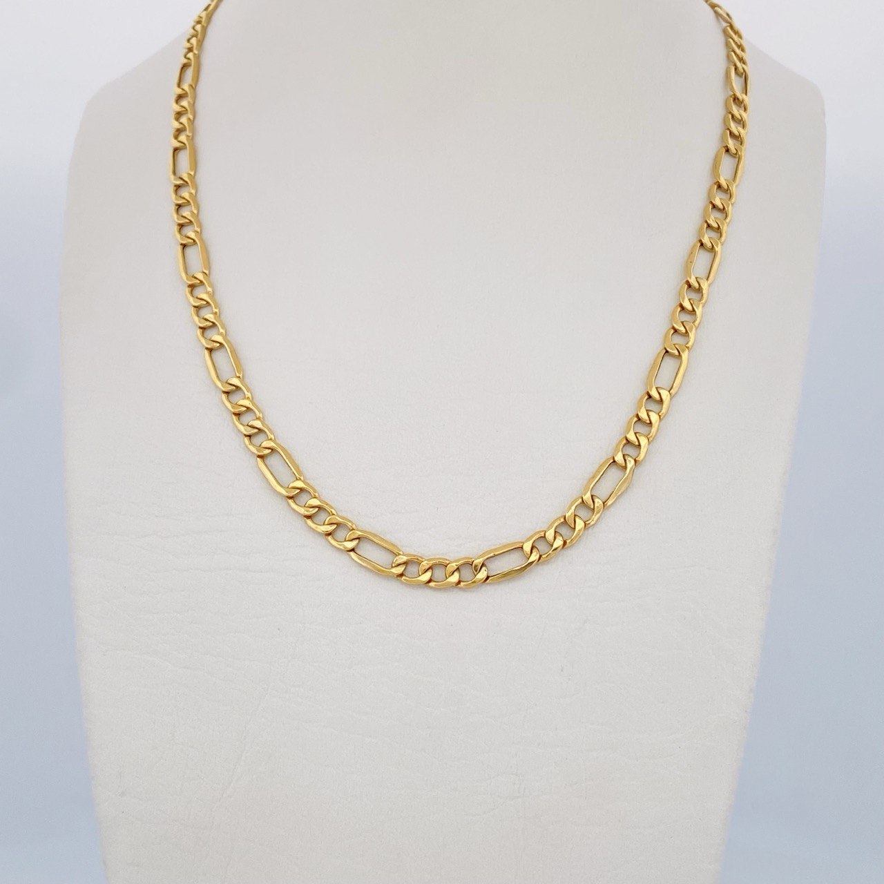 Cadena Figaro 6.45gr / 50.5cm / +1 Oro 18K $