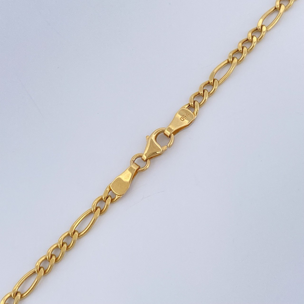 Cadena Figaro 6gr / 55cm / +1 Oro 18K $