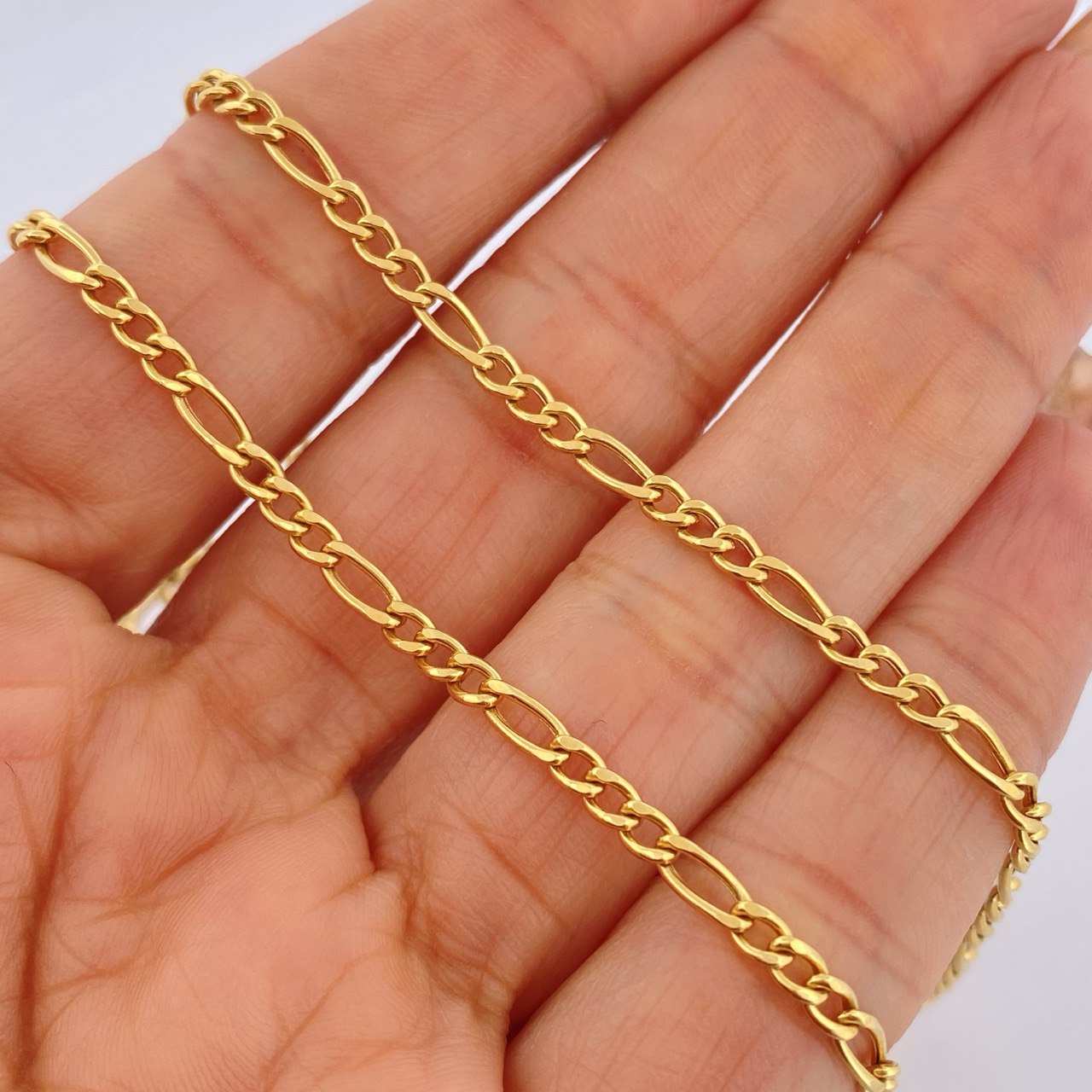 Cadena Figaro 6gr / 55cm / +1 Oro 18K $