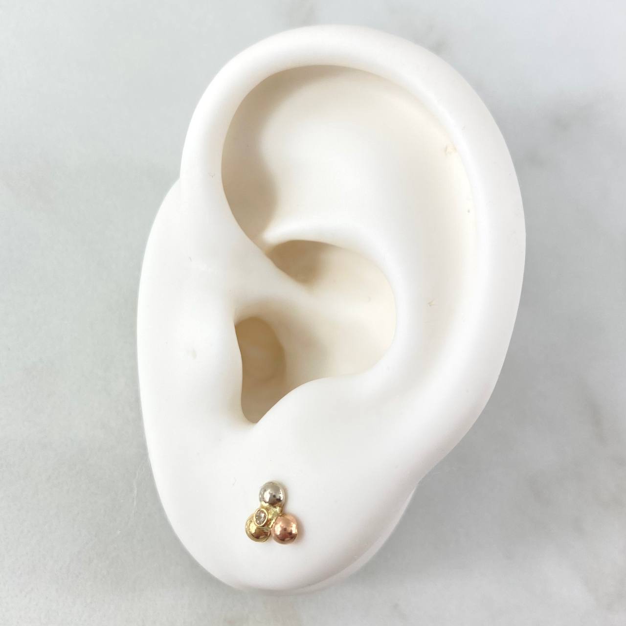 Topos Trio Bolas 0.55gr / Oro 18K *