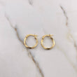 Candongas Eve 1.6gr / 1.9cm / Lisa Oro Amarillo 18K $