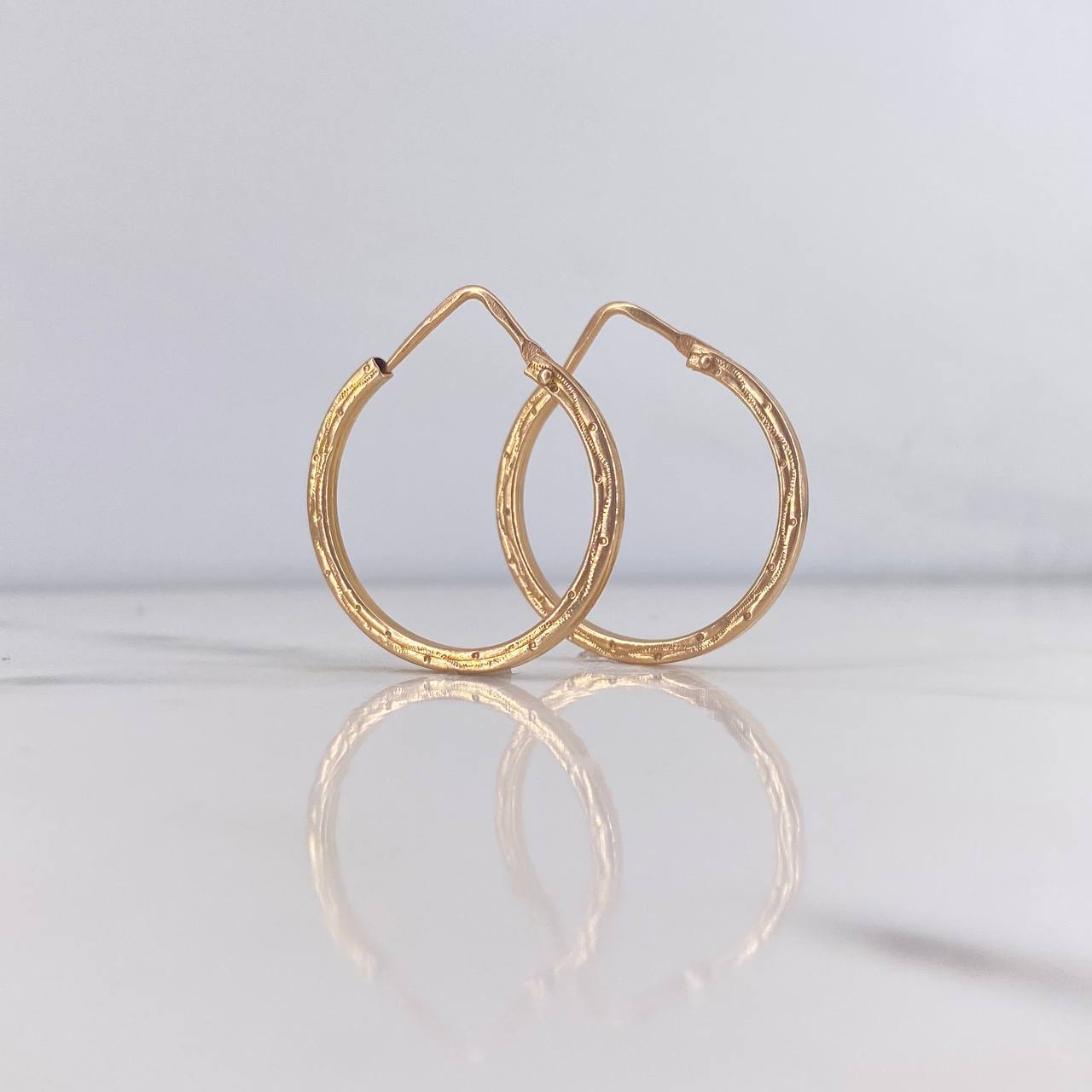 Candongas Celi 2.1gr / 2.7cm / Entorchadas Oro Rosa 18K $