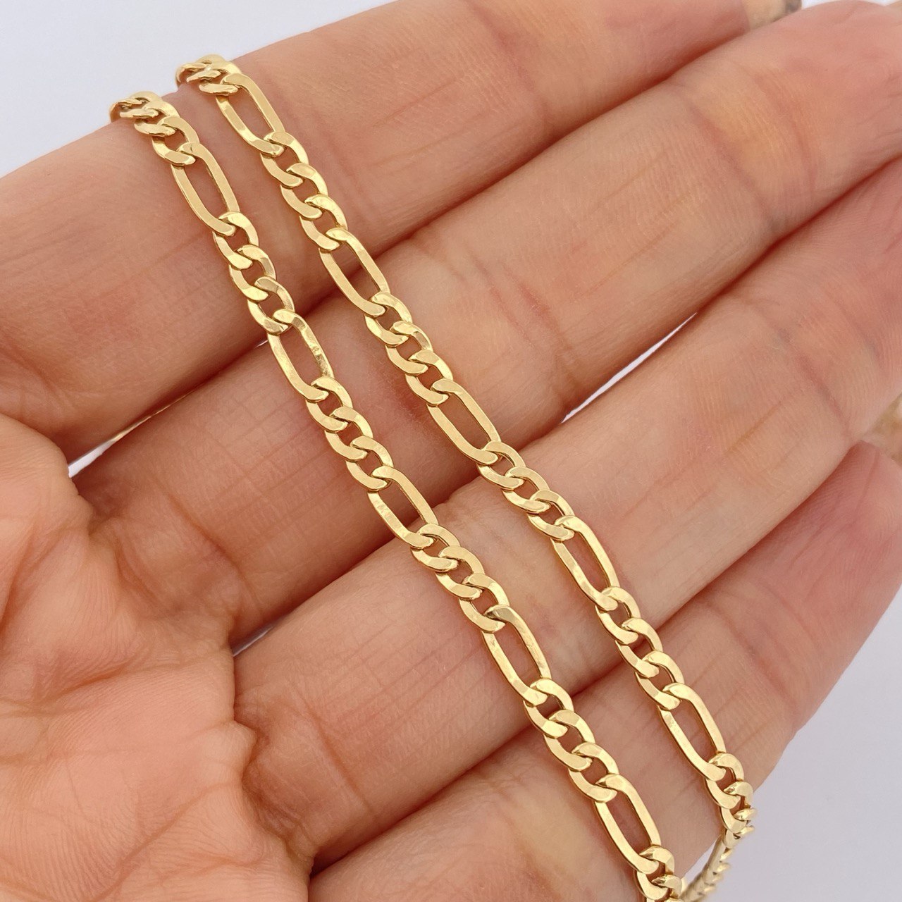 Cadena Figaro 6.2gr / 61cm / +1 Oro 18K $