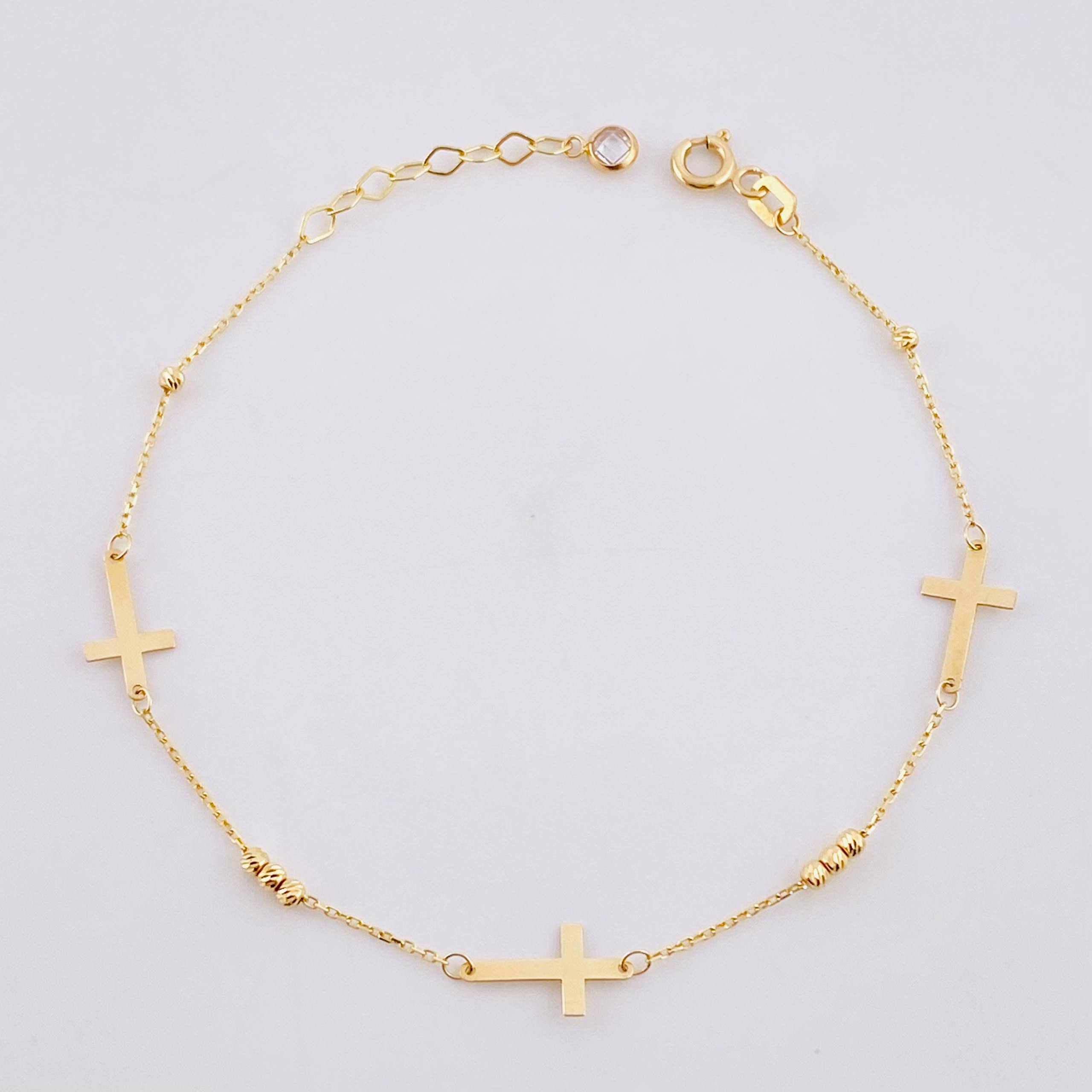 Pulso Aro Seguido Cruz Lisa 1.3g / 19.7cm / 0.6mm Oro Amarillo 18K