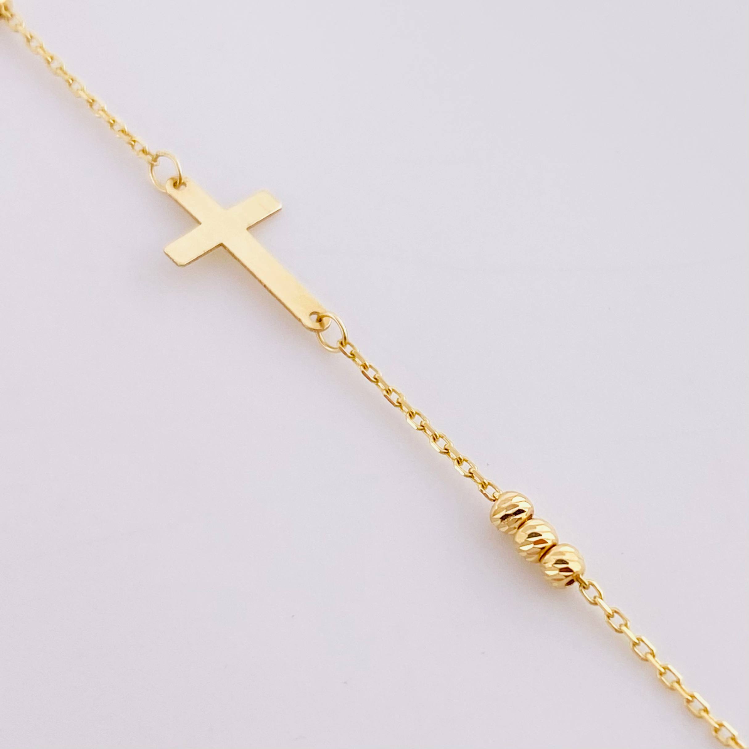Pulso Aro Seguido Cruz Lisa 1.3g / 19.7cm / 0.6mm Oro Amarillo 18K