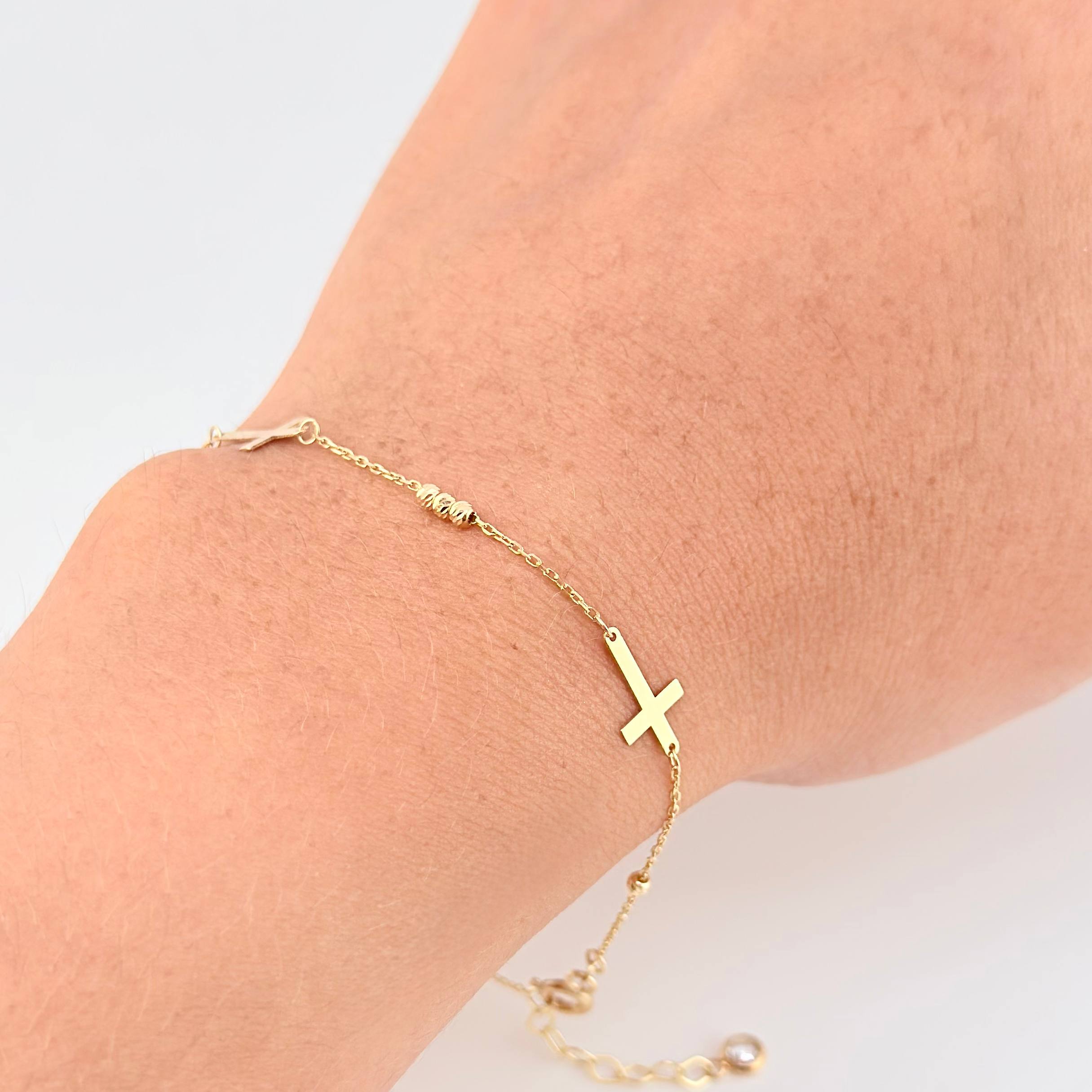 Pulso Aro Seguido Cruz Lisa 1.3g / 19.7cm / 0.6mm Oro Amarillo 18K