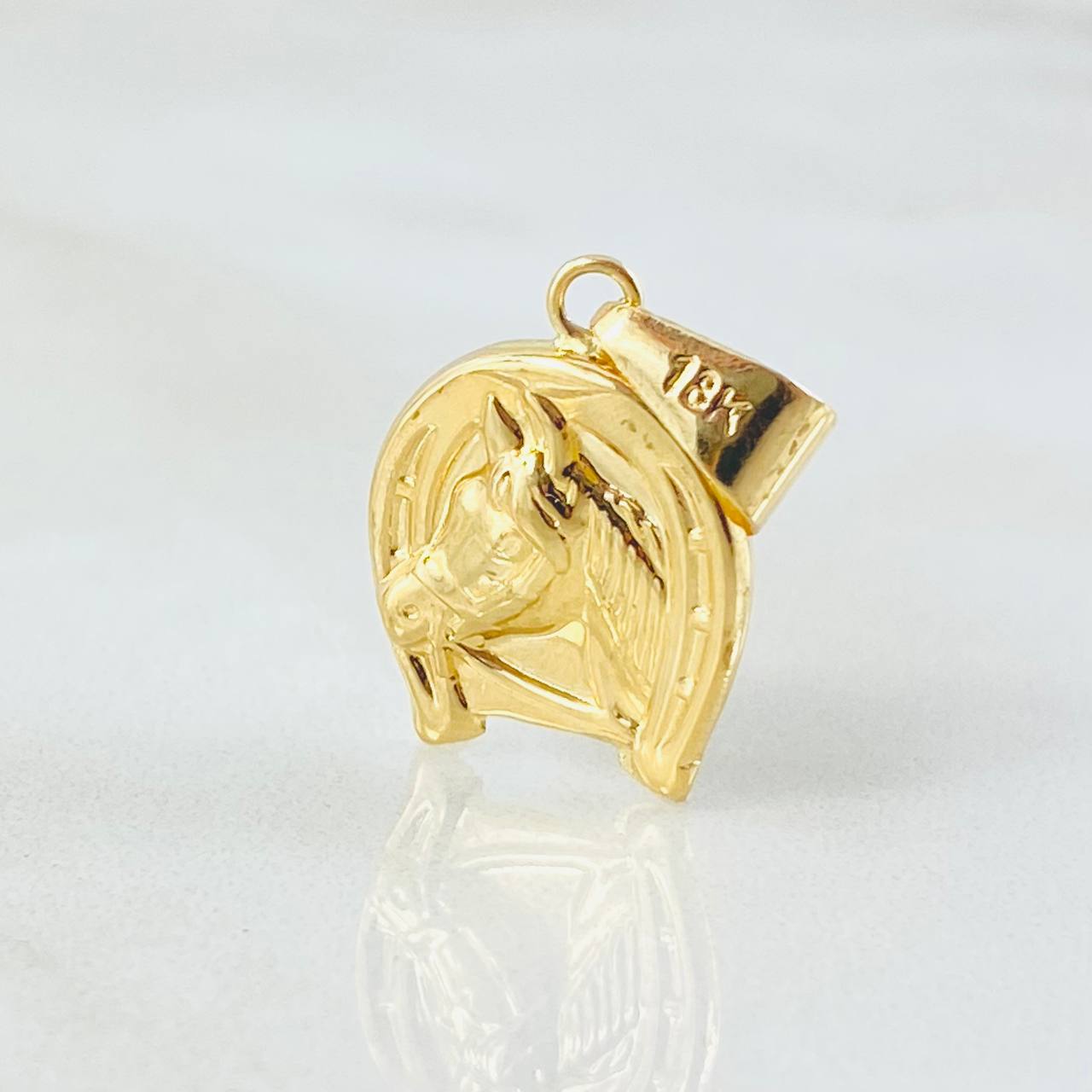 Dije Herradura Caballo 0.95gr / 2.1cm / Oro Amarillo 18K ©