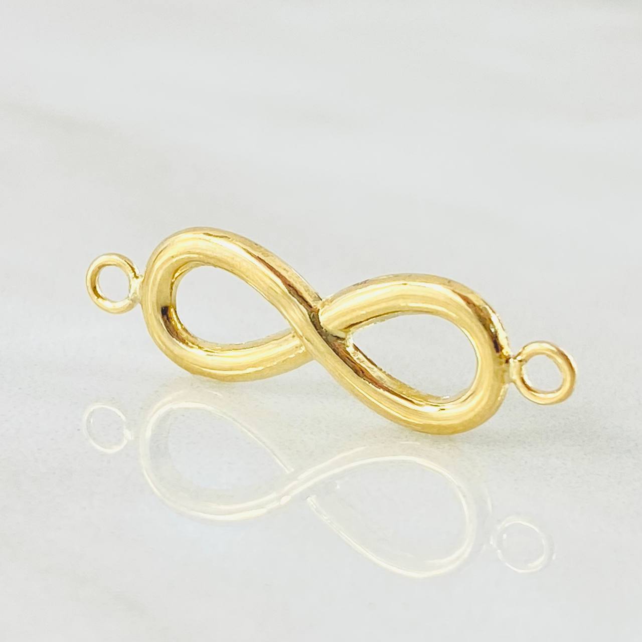 Herraje Infinito 0.9gr / 2.7cm / Oro Amarillo 18K