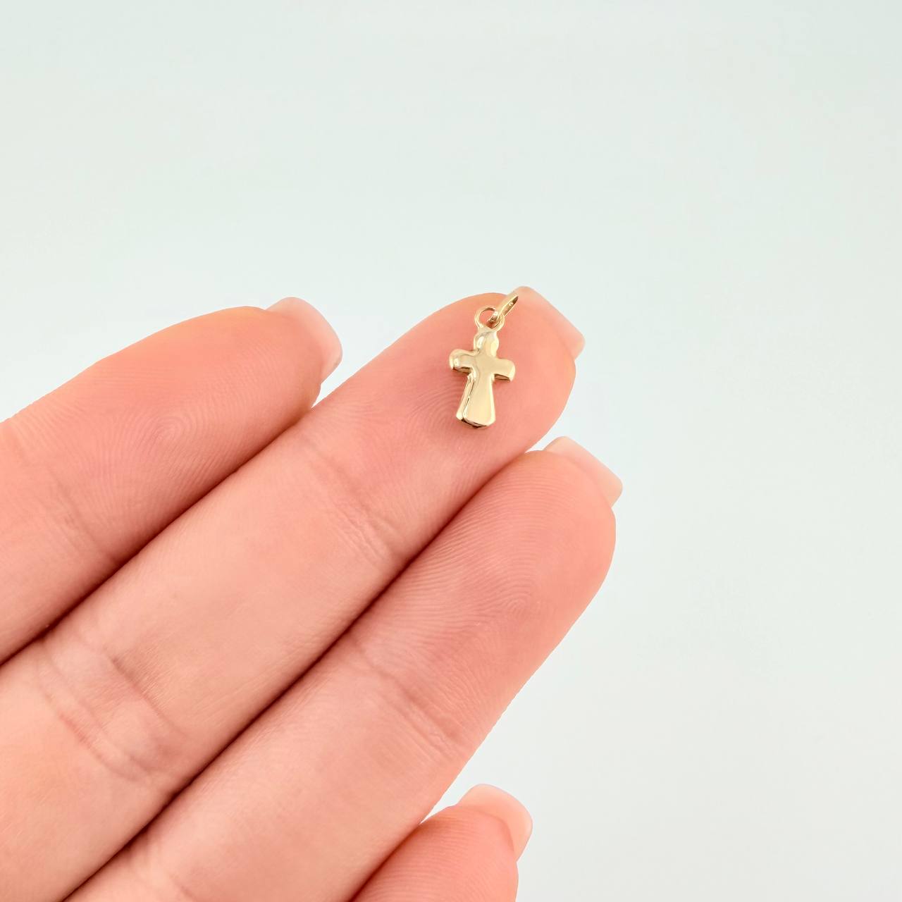 Dije Cruz 0.25 g / 1.5 cm Oro Amarillo 18K