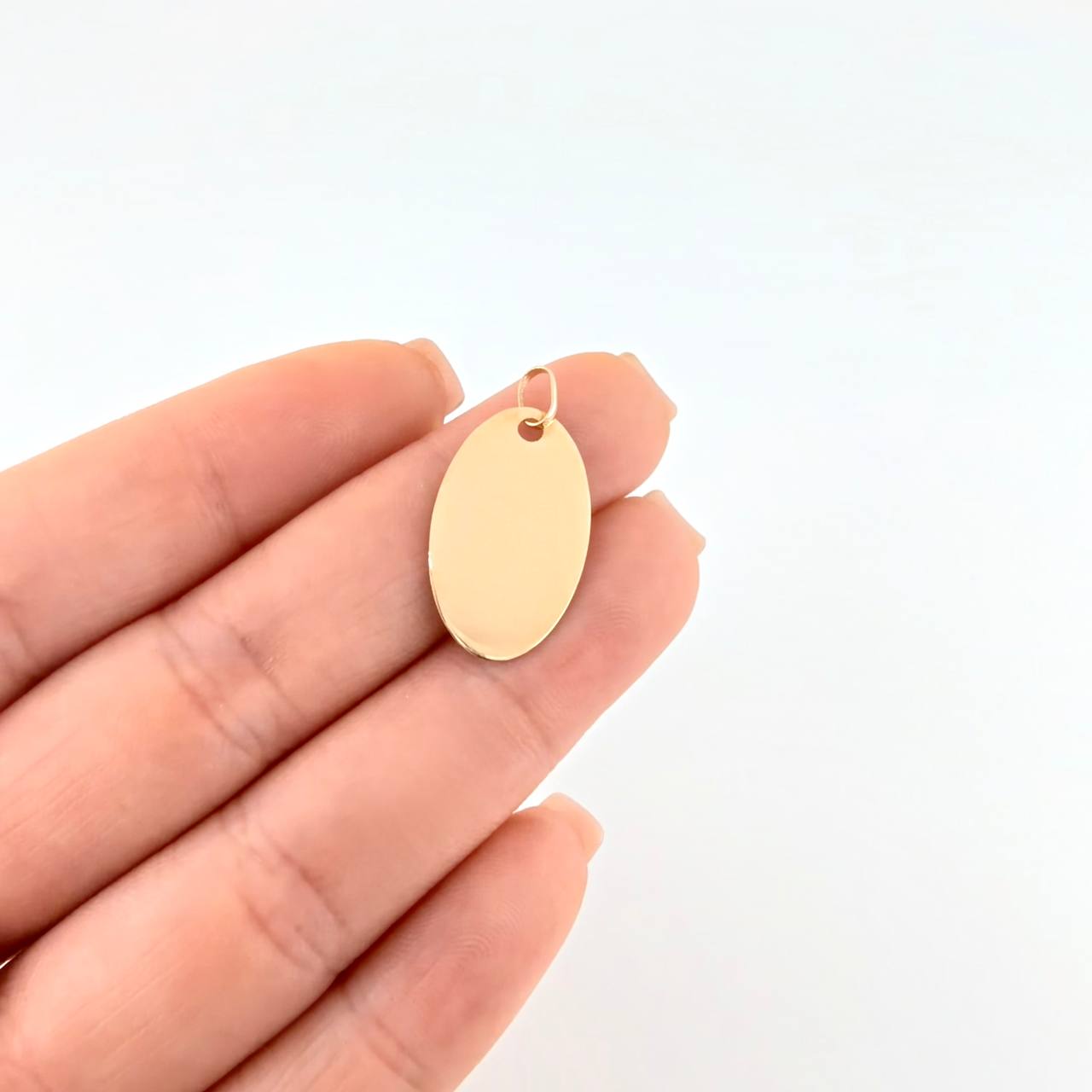 Dije Placa Ovalada 1.15 g / 2.6 cm Oro Amarillo 18K