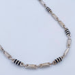 Cadena Rustica Tribal 13.65gr / 60.5cm / 4mm Barril Cauchos Negros Oro Blanco 18K $