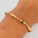 Pulso Rustico Duabi 4.7gr / 21.1cm / 4mm Cauchos Negros Oro Amarillo 18K $