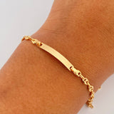 Pulso Bebé GC 1.7gr / 14.5cm / 3.1mm Placa Rectangular Curva Oro Amarillo 18K &