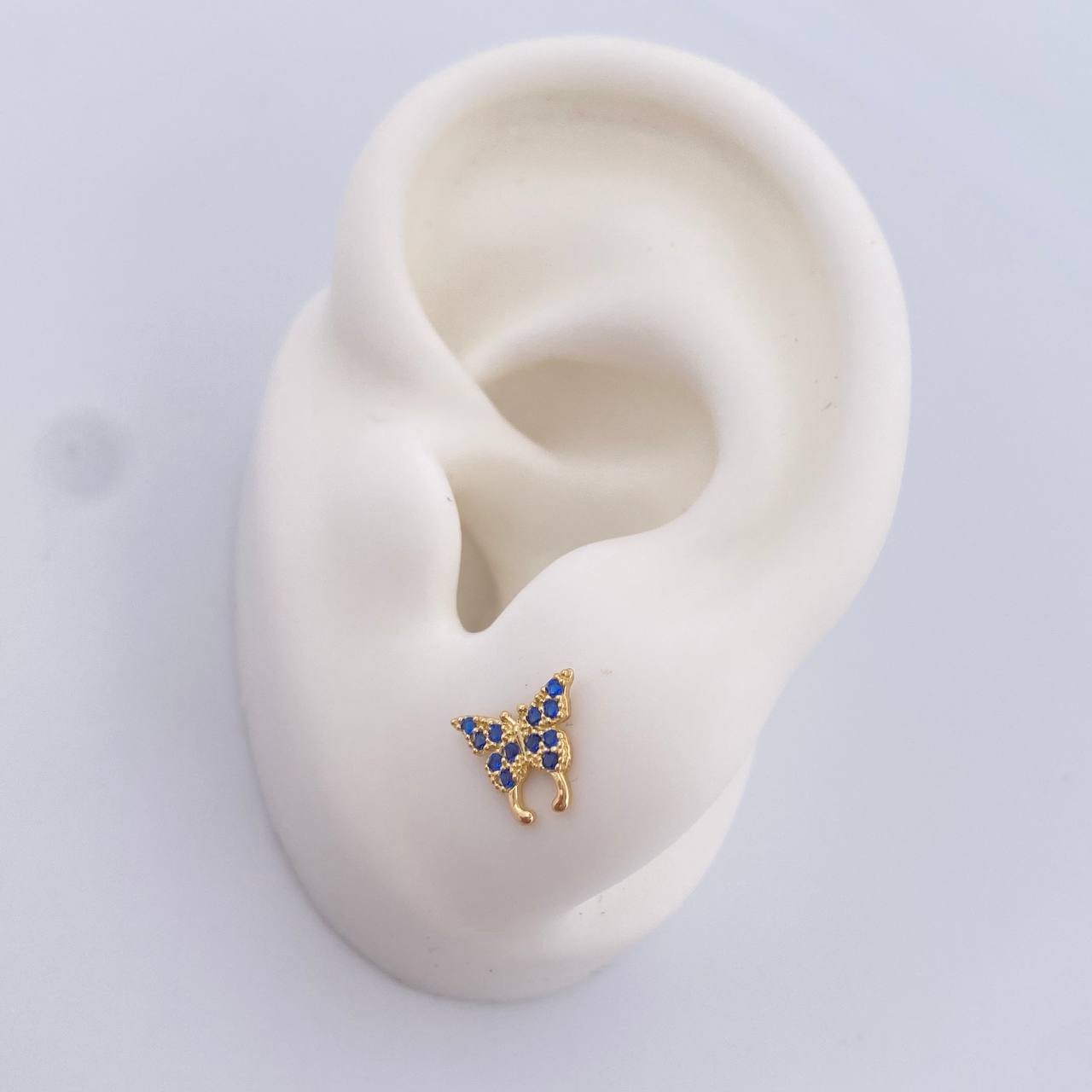 Topos Mariposa 0.85gr / Circones Azules Oro Amarillo 18K $